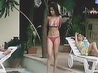 Our camera guy managed record two beautiful Latina bimbos in extra hot bikinis enjoying their day near the swimming pool.