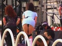 Hey, men! What are these bimbos doing when bending over and demonstrating their sexy upskirts to the crowd?