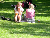 Licentious bimbo Kristina enjoying her lunch on the green grass and doesnt imagine that her white panty upskirt is getting spied!